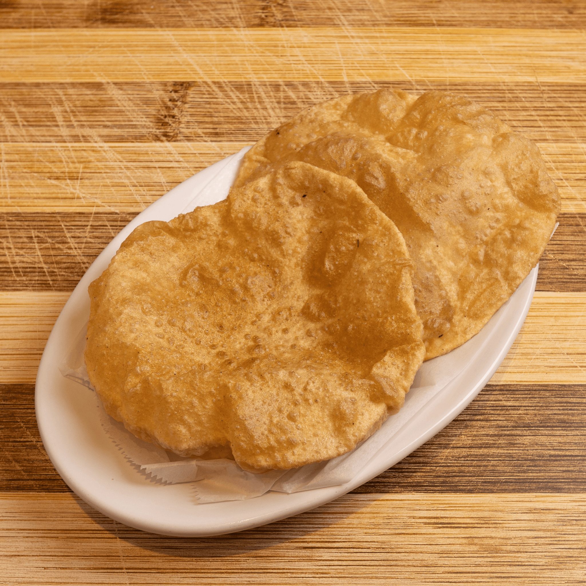 2 Pieces Poori.