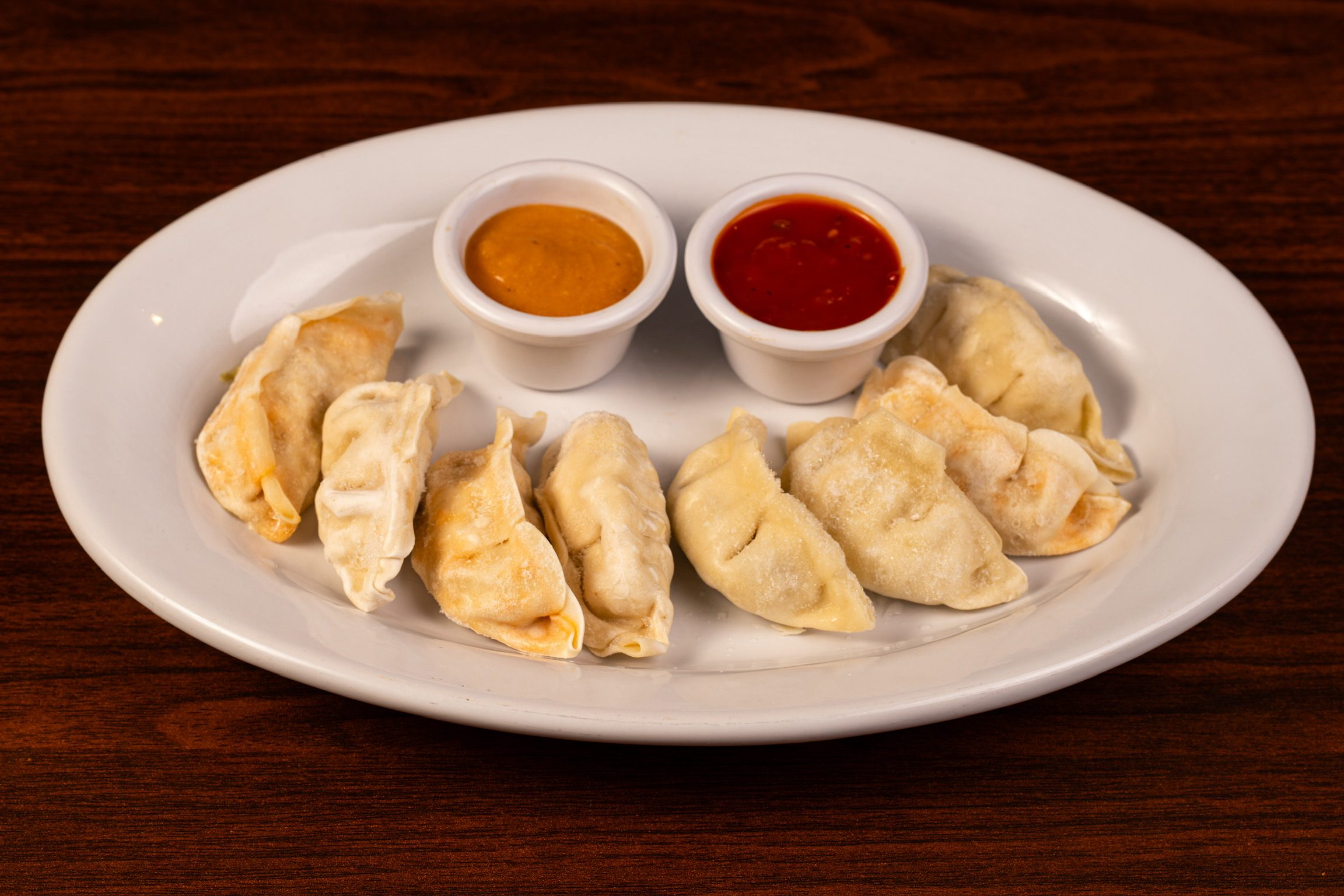 Vegetable Momos (8 Pcs).